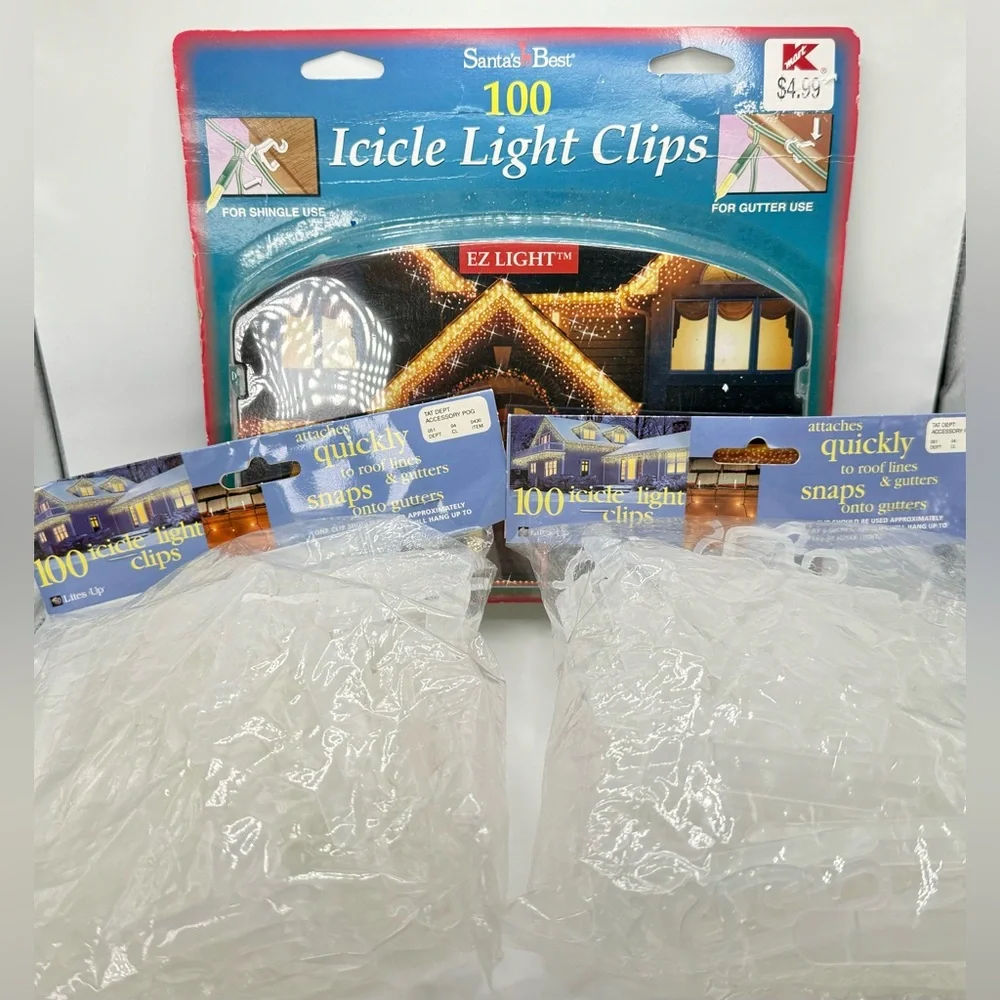 2 Lite Up &1 Santa’s Best 100 icicle light clips 300 total.Christmas light clips